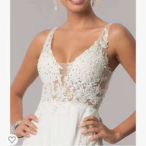 Wedding dress: size 10, white, v neck, leg slit